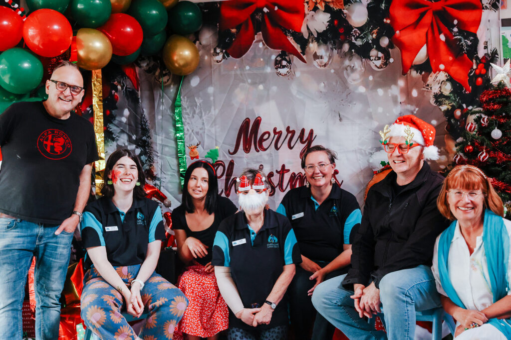 a Christmas themed photo of the team at Embracing Ministries